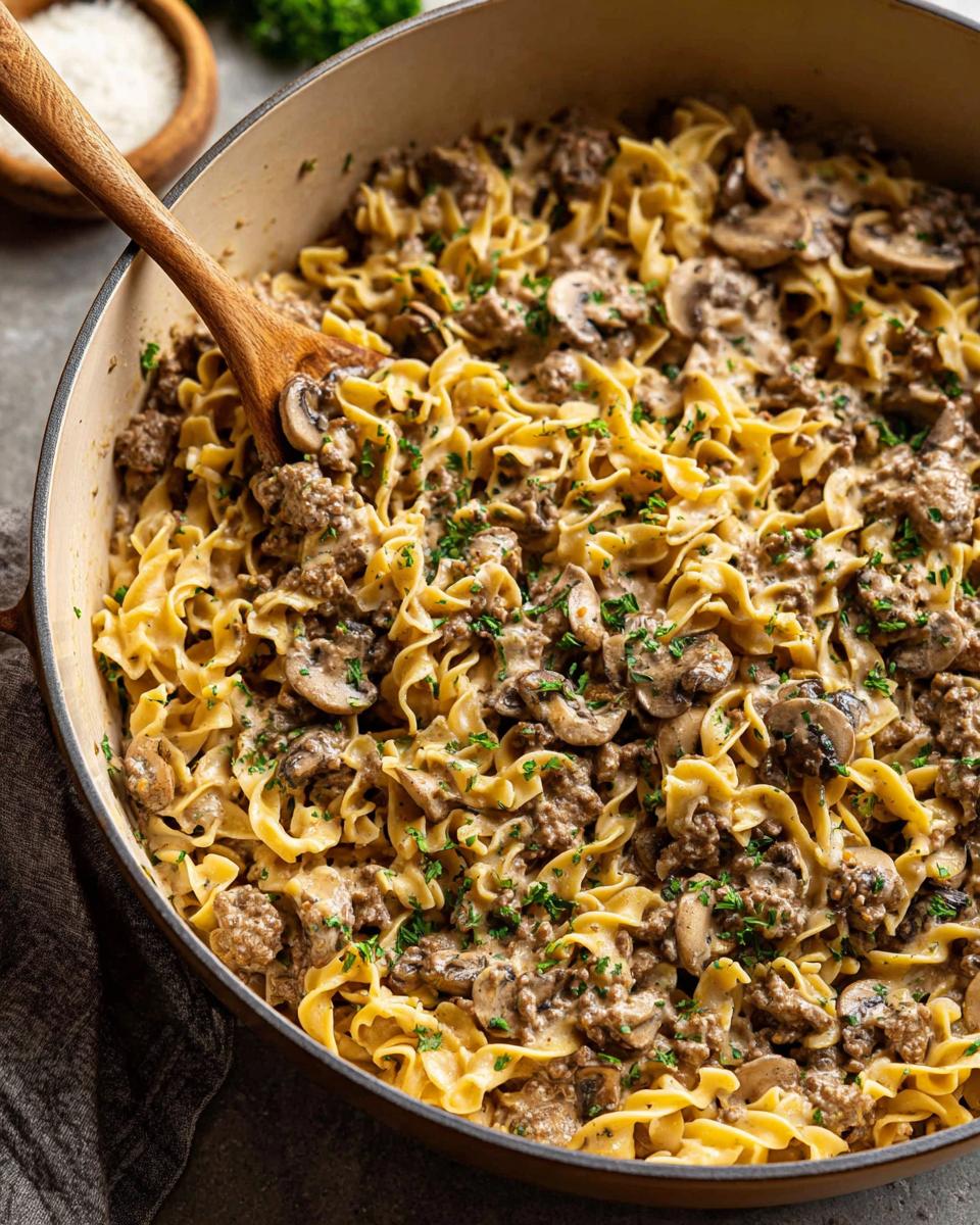 A creamy skillet dish with egg noodles, ground beef, mushrooms, and parsley, part of easy ground beef recipes.